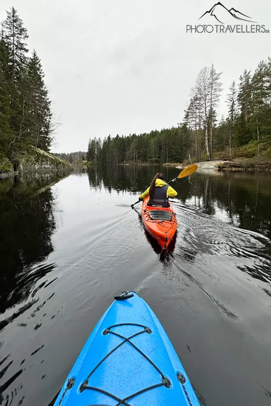 Biggi in a kayak on a lake