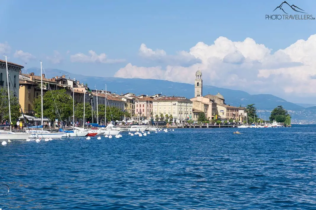 The view over Lake Garda to the beautiful town of Salò with the big church and the Garda mountains in the background