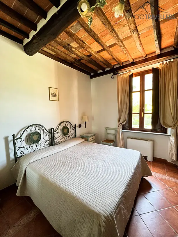 Ein Schlafzimmer im Hotel Villa Cheli