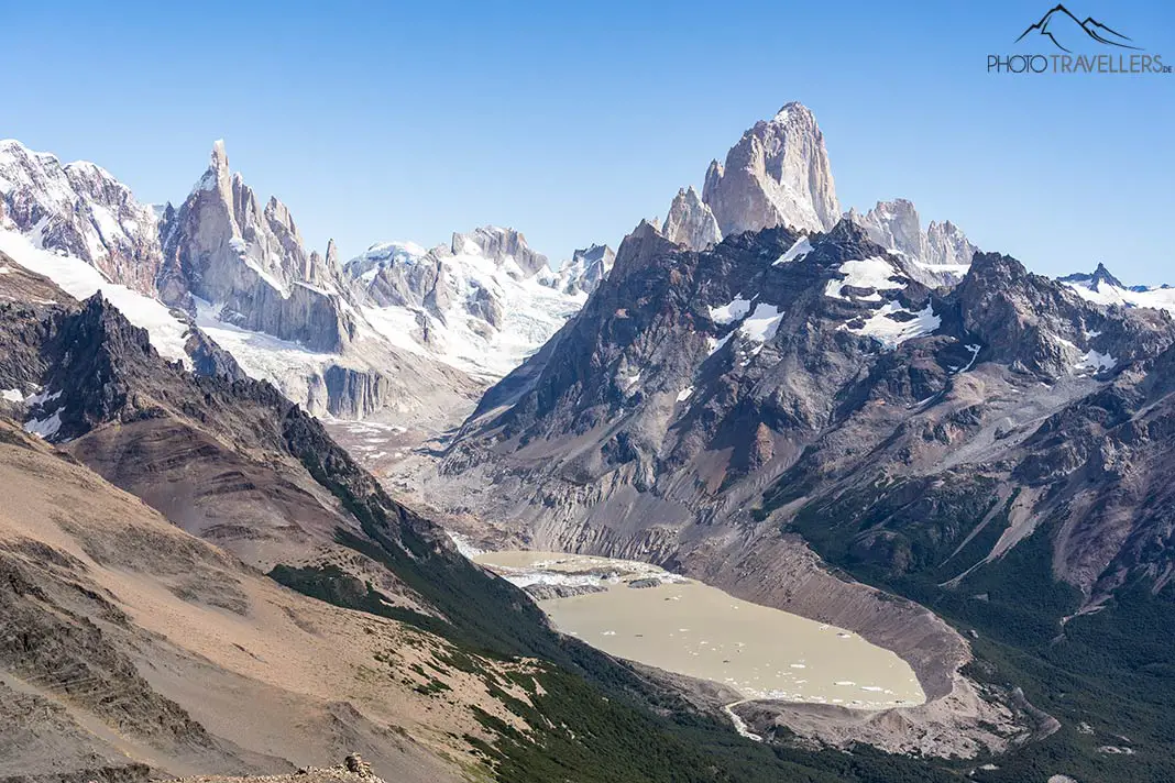 The view from the summit Loma Del Pliegue Tumbado to Laguna Torre with Fitz Roy and Cerro Torre