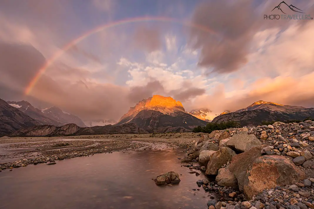 A rainbow over the mountains at the Rio Electrico in Argentina